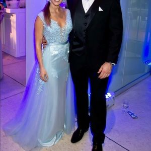 One of a kind blue gown with toole cape and train